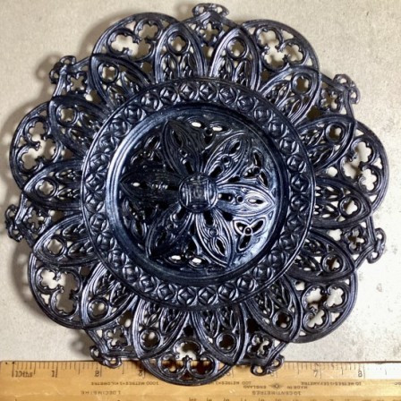 Detail: Antique Russian cast iron decorative pierced plate. 8.6in diameter.