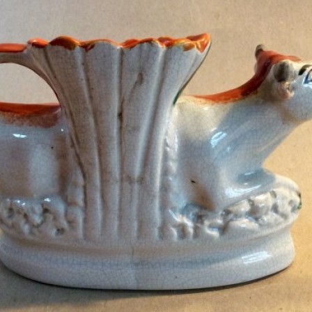 Detail: Victorian pottery Staffordshire cow creamer