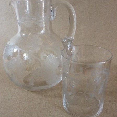 Detail: Etched glass jug and small tumbler
